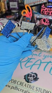 15K views · 122 reactions | Let's seal glitter binder clips and a staple remover with uv resin! 殺✨️ #resin #resinart #glitter #craftideas #diycrafts | Maegen's Glitz and Glam | Facebook