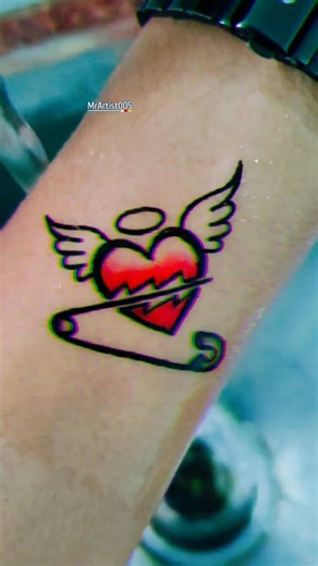 Aw Arts _Mr Artist | Winged _heart broken with safety pin tattoo 👌🔥💔 #together #tattooideas #tattoodesign #brokenhearts #2026Goals | Instagram