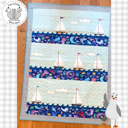 A sailing boat on a sea breeze with creatures from the depths of the ocean swimming below creates the perfect nautical themed quilt. Quilt pattern includes 6 different 8"x8" foundation paper pieced blocks. www.twochickswhosew.etsy.com #sailboatfpp #sailboatquilt #twochickswhosew #boatquiltblock | Two Chicks Who Sew LLC