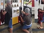 Driver pulls out HUGE snake stuck in gas pump using his hands