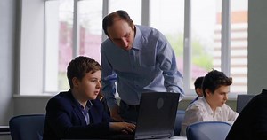Informatics Lessons In Middle School, Teacher And Pupils In Modern Computer-Based Classroom