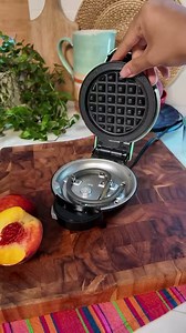 For our August Waffle of the Month, we wanted to savor the last bits of summer flavor, so we whipped up a Peaches-n-Cream Puff Pastry Tower. Peaches reach their peak in the late summer months of July and August, and this fresh-but-decadent dessert seemed a fitting way to close out the summer and begin moving into fall. 🍑 Full recipe below! Ingredients: 1 box of puff pastry dough (thawed if frozen) 1 can of peach pie filling or fresh peaches sweetened with sugar, sliced 8 ounces whipped cream to