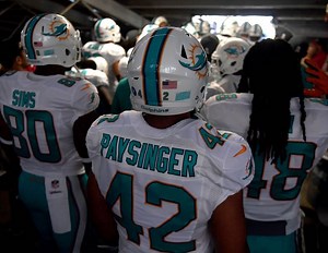 How much money did Spencer Paysinger make in the NFL?