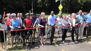 Howard County Executive Calvin Ball today cut the ribbon on the new Howard Community College Connector. “By opening the HCC Connector, we are ensuring a safe, inclusive, and convenient way to get around the campus and around the community,” said Ball. The project, which received a majority of its funding through a Maryland Bikeways Grant from the Maryland Department of Transportation includes: • A shared use pathway through the HCC campus from Hickory Ridge Road to Little Patuxent Parkway • Bike