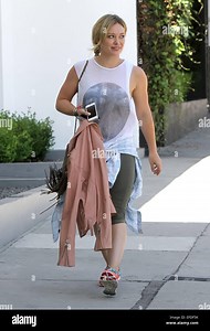 Hilary Duff is all smiles as she departs her gym following a workout. Duff has just released her first music video in 6 years for her new single 'Chasing the Sun'.  Featuring: Hilary Duff Where: Los Angeles, California, United States When: 30 Jul 2014 Stock Photo - Alamy