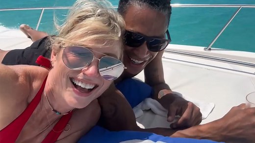 Amy Robach, 50, rocks red bikini on yacht as she cuddles up to TJ Homes