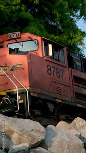 Canadian Pacific Railway Diesel Engine Locomotive Freight Train Departing Industrial City Railway Yard Bridge Tanker Cargo Cars Leaving Refinery Station Rail T. High quality 4k Stock Video