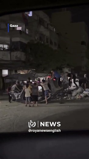 Gaza children turn wrecked car into playground