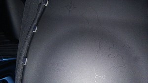 There is a map underneath the passenger seat in the...