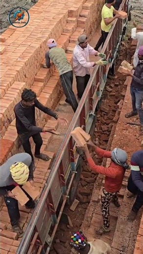Coordination of Workers Stacking Bricks #teamwork #brickwork