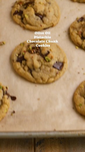 These Olive Oil Pistachio Chocolate Chunk cookies are perfectly chewy, take only 30 minutes to make, & require no chill time! Truly a must make for any Holiday gathering or cookie boxes this year! . Get the recipe here: https://shortgirltallorder.com/vegan-olive-oil-pistachio-chocolate-chunk-cookies . #vegancookies #oliveoilcookies #christmascookie #oliveoilchocolatechipcookies | ShortgirlTallorder Blog
