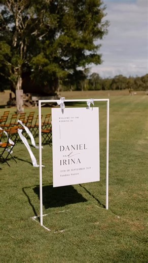 Blue Bird Invitations on Instagram: "Daniel and Irina ❤️ White elegant signage, ceremony by the lake at beautiful @yandinastation Styling @simplystyleco Florals @willowbudflowers Photography @graemepassmore #2026bride #weddinginspiration #australianwedding #yandinastation #goldcoastwedding #weddingplacecards #noosawedding #yarravalleywedding #weddingsignage #hinterlandwedding #walkdowntheaisle #melbournewedding #weddingmenus #weddingseatingchart #sunshinecoastwedding #graphicdesign #adelaidewedd