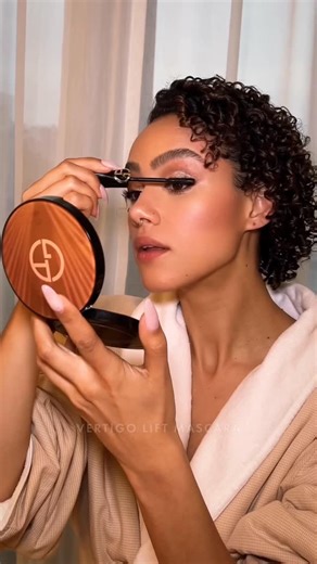 Armani beauty on Instagram: "Giorgio Armani Global Makeup Ambassador @nathalieemmanuel gets ready to attend the British Museum Ball wearing @armanibeauty. Recreate the look using: COMPLEXION -LUMINOUS SILK FOUNDATION in shade 5.75 -LUMINOUS SILK CONCEALER in shade 5.75 -LUMINOUS SILK GLOW FUSION POWDER in shade 6.5 -LUMINOUS SILK FLUID SHEER GLOW ENHANCER in shade 2 -LUMINOUS SILK GLOW BLUSH in shade 52 EYES -EYE TINT in shade 44S -SMOOTH SILK EYE PENCIL in shade 12 -VERTIGO LIFT MASCARA LIPS -L