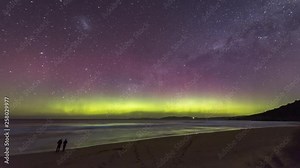Incredible time lapse of the Southern Lights or Aurora Australis from a beach in Tasmania, bioluminescence in the breaking waves.