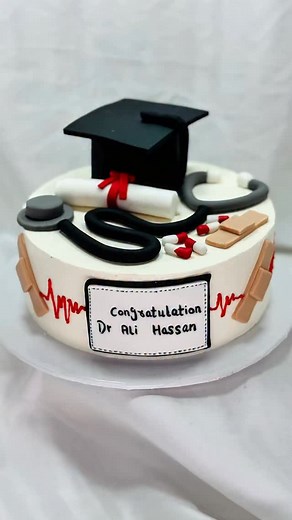70K views · 3.6K reactions | Dr Cake / Graduation Cake♥️ Designed By MG Bakers . Dm For Order   03041871990 . . . #cakes #multan #multanblogger #bakerylife #multancakes #cakesinmultan #mgbakers #reels #birthdaycake #cakedecorating #cakeart #cakerecipe #chocolatecake #weddingcake #nikkahcake #bridetobe #nikkahmubarak | MG Bakers | Facebook