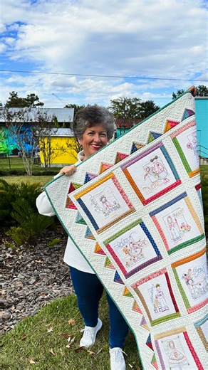 The Garden Girls Quilt showcases twelve adorable girls, each beautifully adorned with their favorite flowers. Measuring 46″ by 58″, this delightful quilt is sure to become a cherished family keepsake for years to come. This 14-month membership provides everything you need to complete the entire quilt top, including hand embroidery threads, making it easy to bring each design to life! | Stitches of Love