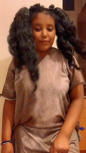 Expressive Hand Movements in a Shiny Silver Dress