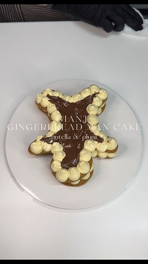 1K views | Giant gingerbread man, but make it CAKE ✨ Soft gingerbread sponge, layered with vanilla bean cream, Nutella and plum confit… a proper Christmas hug in dessert form. Part of my Christmas offer – limited availability. DM to order & secure your spot  Glasgow Cakes Christmas Cake Birthday Cake #gingerbread #christmascake #christmas #glasgowcakes #glasgow | Plum & Pastry | Facebook