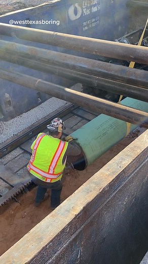 Lowering Auger Filled Pipe into the Box | West Texas Boring