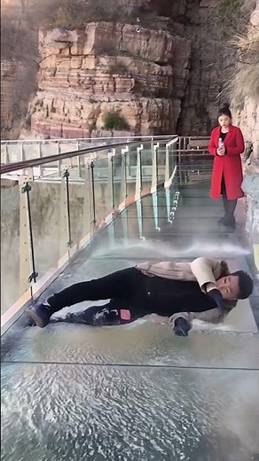 MAN SLIPS AND FALLS FROM BRIDGE 🌉💥😱#shorts