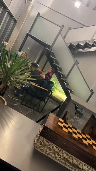 Modern Lounge Setting with Engaging Conversations