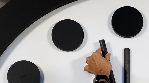 What is the 'Doomsday Clock' and what happens when it hits midnight?