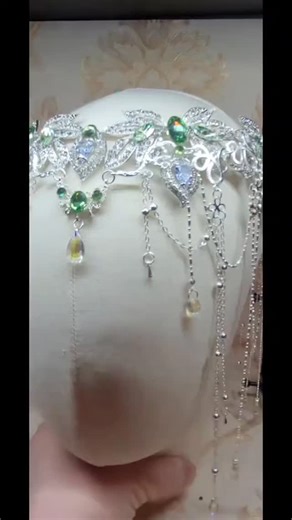 This is my most popular lord of the rings inspired wedding tiara! I can do it in a variety of accent stone colors and it's so popular I never make enough for events!! https://queensclosetbydowdle.etsy.com/listing/1710766619 #lordoftheringswedding #tiaras #lordoftherings #customizedtiaras | Queen's Closet by Dowdle