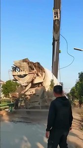 Excavator failure when lifting loads beyond the limit