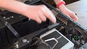 Hands with screwdriver assemble CPU cooler and NVidia GeForce RTX 3080 graphics card in PC. Then check power supply cable plugs before connecting into GPU. Mining hardware. Odessa, Ukraine, 04 07 2021