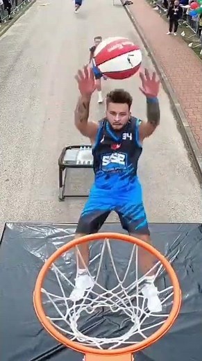 Group of People Attempt Impressive Basketball Tricks With Trampoline - 1333956-1