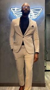 44 reactions | Balancing elegance with boldness, all in a day's work. Cream suit meets black shirt | Bogart Man | Facebook