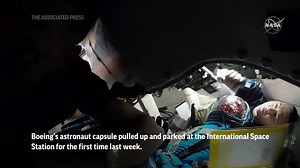 Astronauts prepare Boeing capsule for return