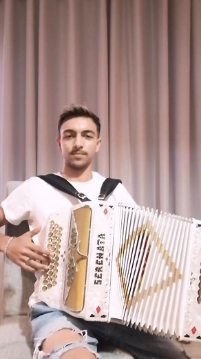 La Celebración de la Concertina con Niño da Concertina