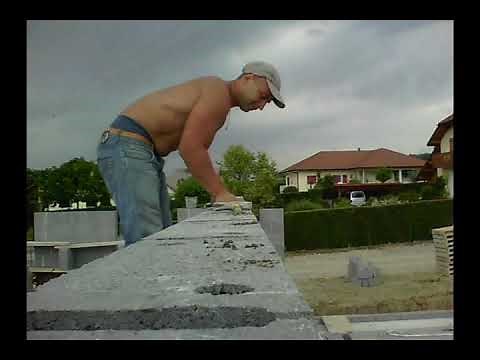 Montage d agglos, pose de parpaings , étaler le mortier