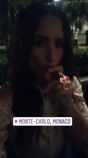 Demi Lovato smoking a cigar