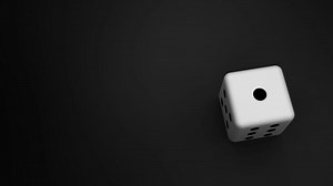 Download single dice rolling on a black surface and stopping at number 1 with one black dot, ideal for casino or gambling themes. for free