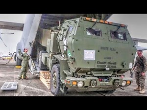 Loading HIMARS Rocket Onto KC-130J Aircraft