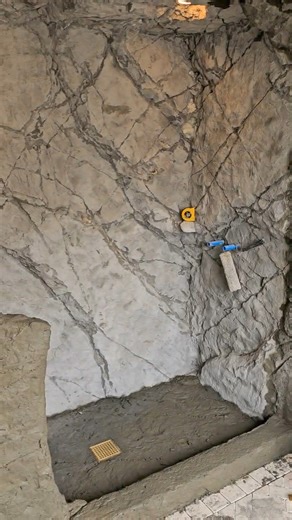 I built a cave shower in my house! 🪨 #rockshower #rockreplica #rockscapesofcanada #fauxrock #construction #build #design #home #interiordesign #artificialrock #decorativeconcrete #concrete #carve #art #artist #artificialrockwork #shower #custom #customshower #dream | Rockscapes