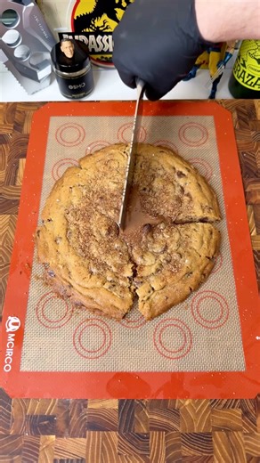 One giant chocolate chip cookie stuffed with a massive Hershey Kiss 🍪🍫 Break it open and watch the chocolate melt. One of the gooiest cookies you’ll ever make. Perfect for kids and families. #CookieHack #GooeyDessert #FamilyBaking #ChocolateLovers #EasyTreats | Ryan Tyler Cooks