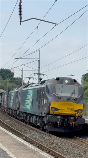 A pair of DRS Class 88 Electric Locomotives on a Tesco Train through Oxenholme Lake District