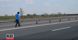 Watch as man risks his life to save pup