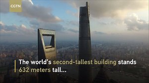 China's tallest building – Shanghai Tower – opened its top-floor sightseeing area to the public on Monday night. "Summit 632" is on the 125th and 126th floors of the building, 583.4 meters above ground. The mega-mall skyscraper stands 632 meters and has 128 floors, covering a total floor space of 380,000 square meters. | CGTN