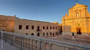 Explore Gozo Citadel's Historic Streets, Baroque Architecture and Mediterranean Views in Malta's Medieval Fortress. Cathedral of the Assumption of the Blessed Virgin Mary into Heaven in focus.