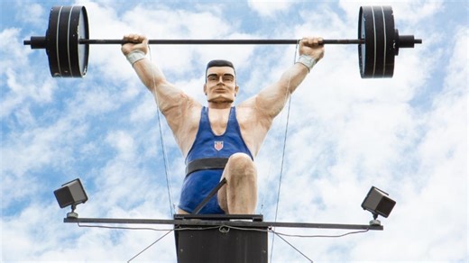 York Barbell Company is thinking about getting its iconic 'Barbell Man' statue moving again