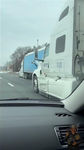 Trucker with too much snow on trailer.