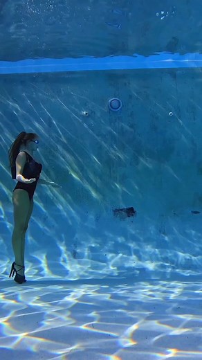 BREAKING THE LAW OF PHYSICS 👠💧🕰️ #gravity #underwater #walk #pool #superpower