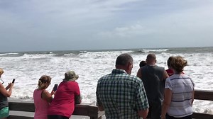 Bystanders check out Hurricane Dorian storm surge at Hightower Beach