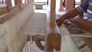 Weaving in a traditional textiles factory in mexico