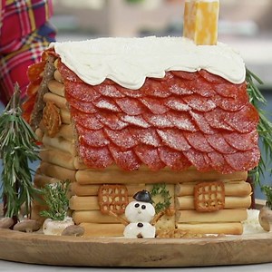 Make a snowy chalet out of cheese and crackers! Get the recipe: http://www.foodtv.com/5bm9e. | Food Network