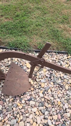 The horse drafted potato digger. Parts are missing.